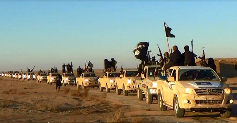 Image: ISIS began its invasion into Iraqi territory from NATO-member Turkey, through Syria and riding in Toyota Hilux trucks – identical to those provided to “moderates” by the US State Department as part of multi-million dollar “non-lethal” aid packages. ISIS did not take these trucks from “moderates,” the moderates never existed to begin with. From the beginning, it was the West’s plan to raise a mercenary army of sectarian extremists operating under the banner of Al Qaeda.